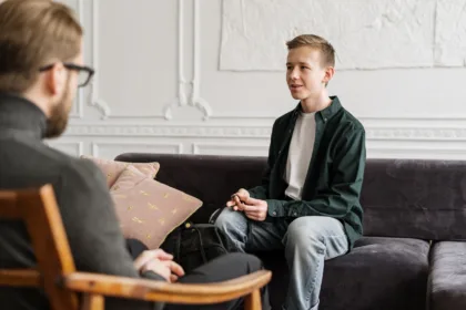 Boy speaking to a therapist