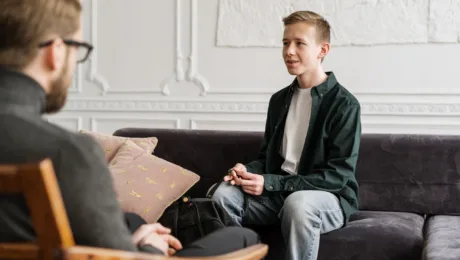 Boy speaking to a therapist